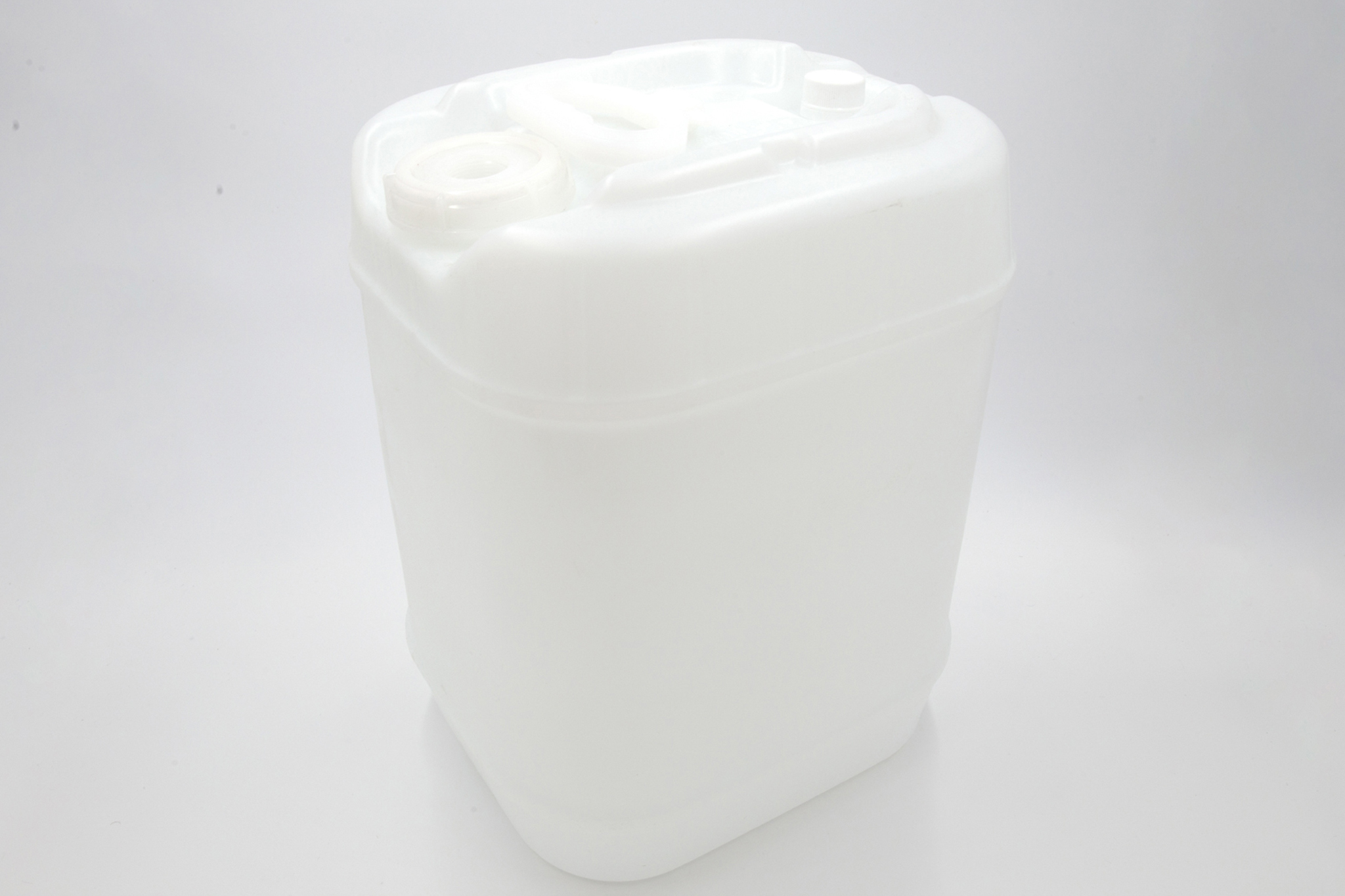 Large clear plastic carboy on white background