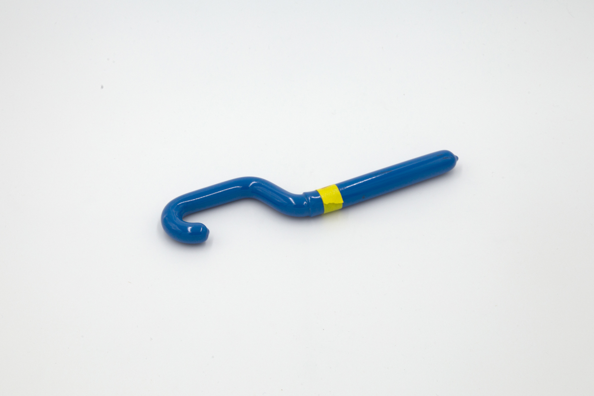 Blue cap wrench on white background