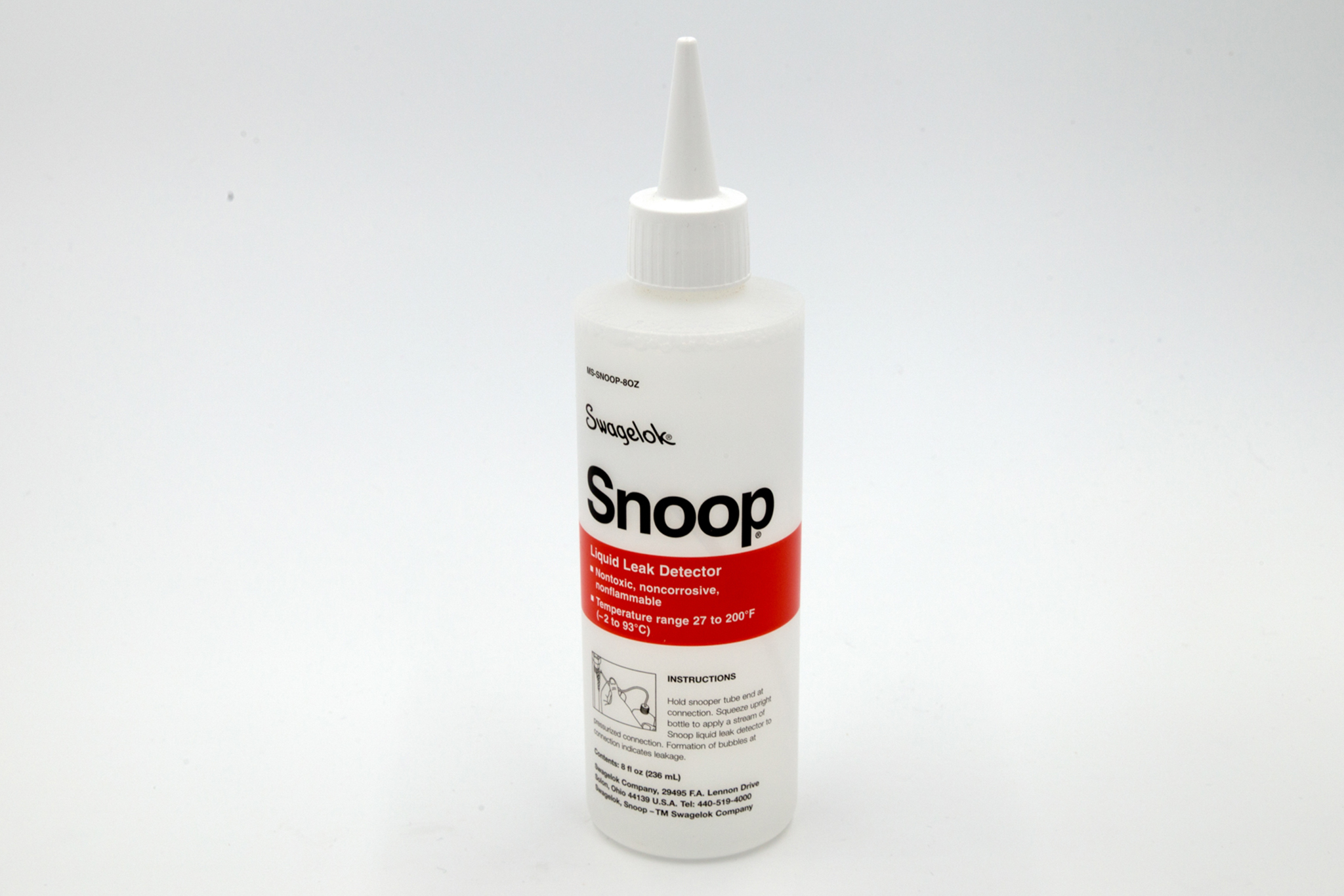 Plastic bottle containing snoop on white background