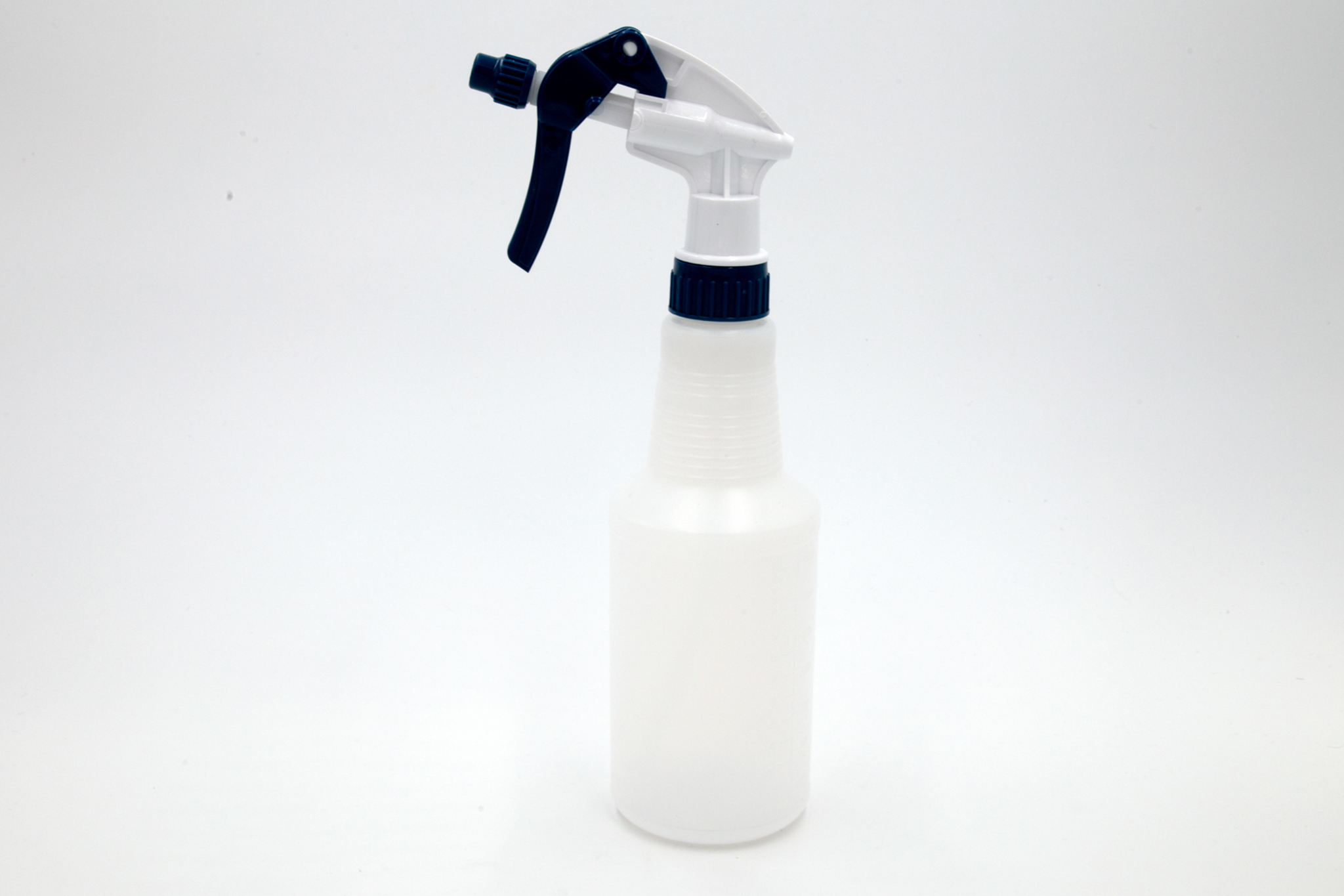 Plastic spray bottle on a white background