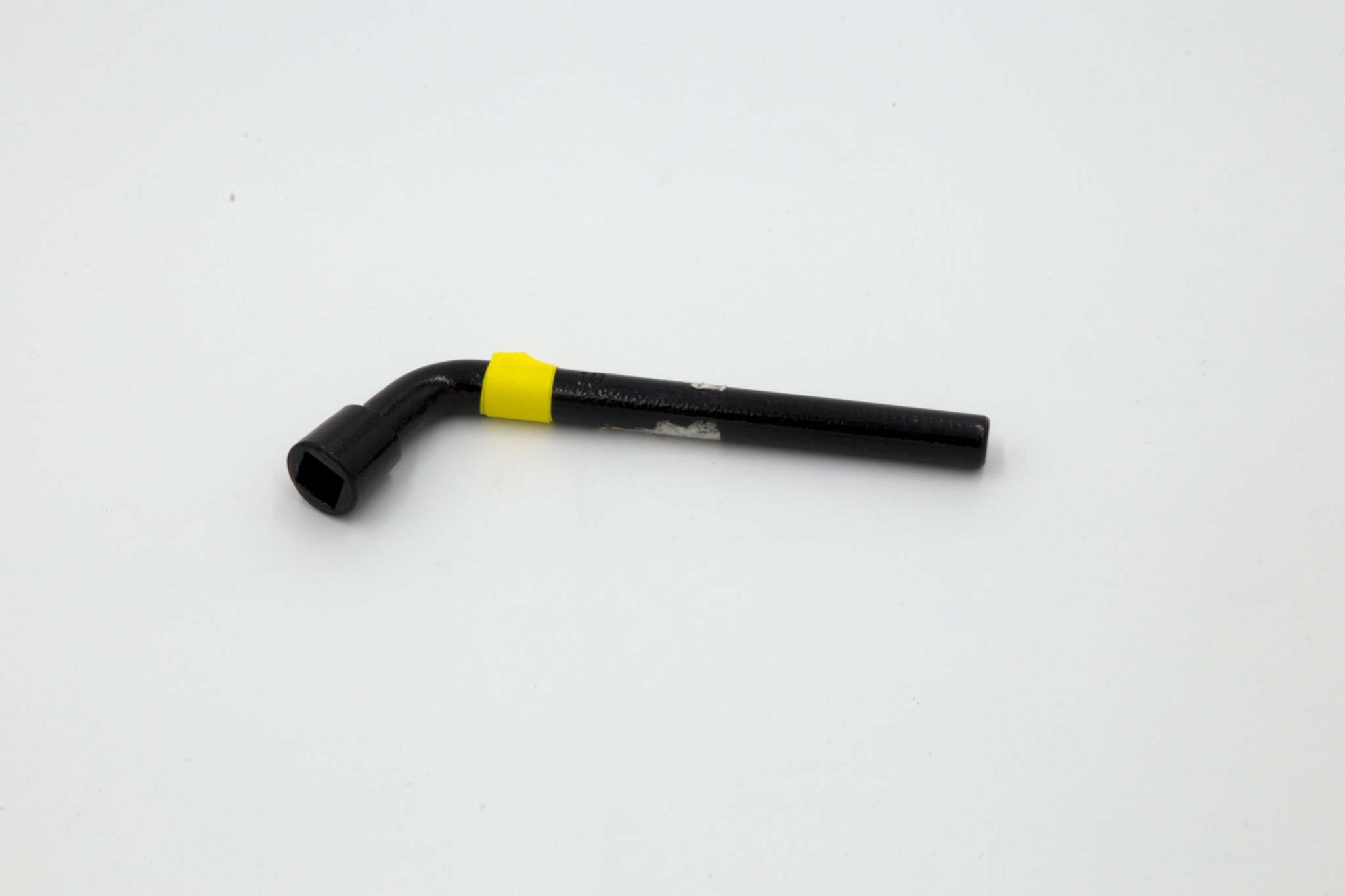 Black square wrench on white background