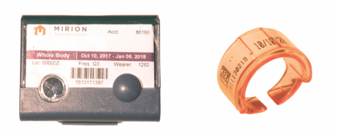 Image of body badge and ring badge dosimeters.